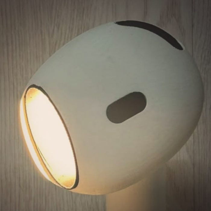 Close-up of the glowing shade of the Printisty designer lamp