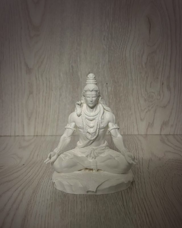 3D printed white Shiva idol seated in meditation